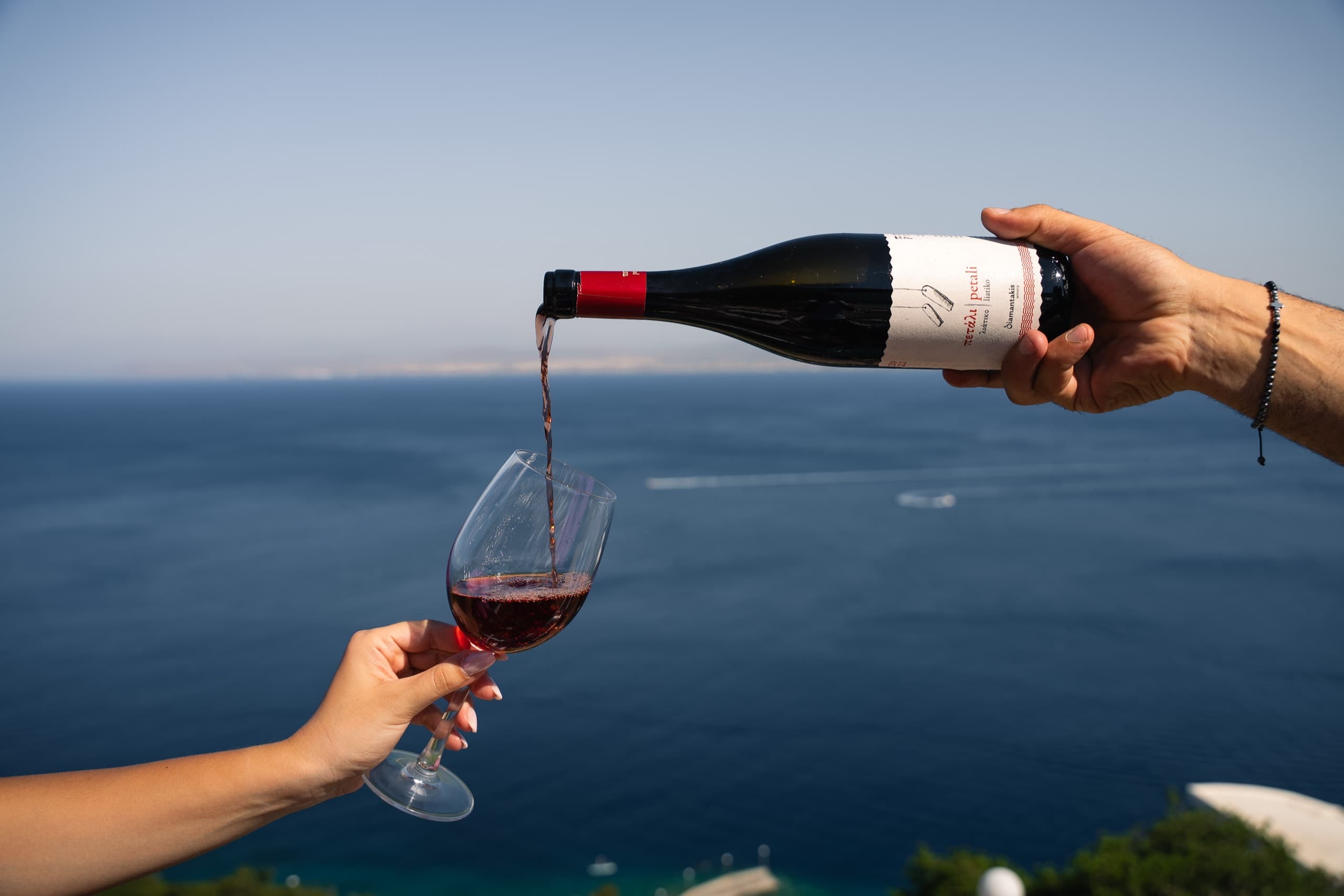 A glass of wine poured at the Thyrea wine bar in Crete